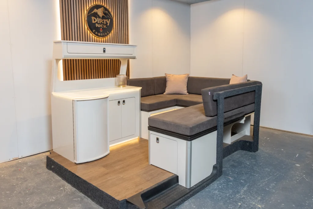 Campervan kitchen with U-shaped seating